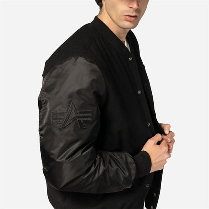 The Male model is wearing New Era x Alpha Industries Black Varsity Jacket 6