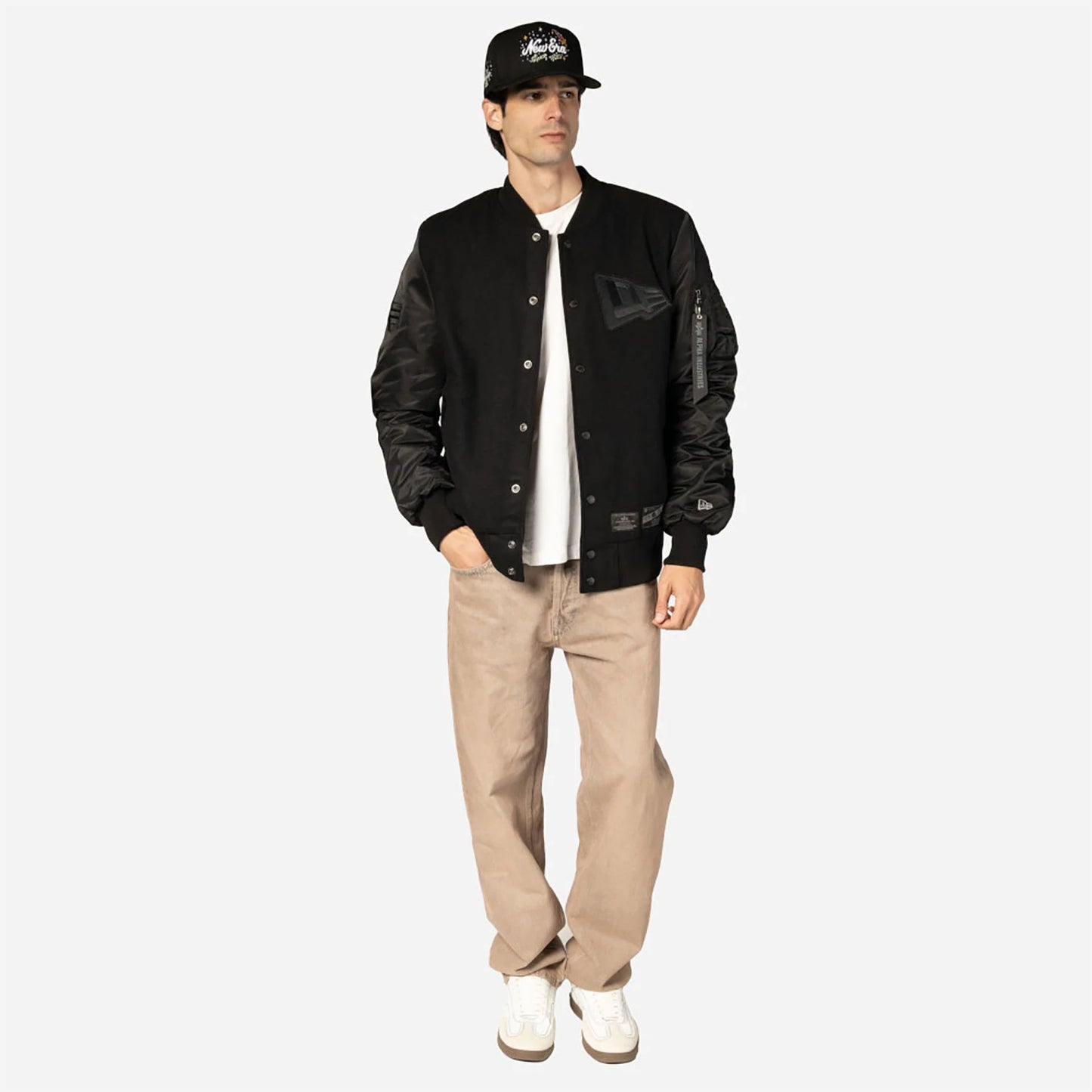 The Male model is wearing New Era x Alpha Industries Black Varsity Jacket 9