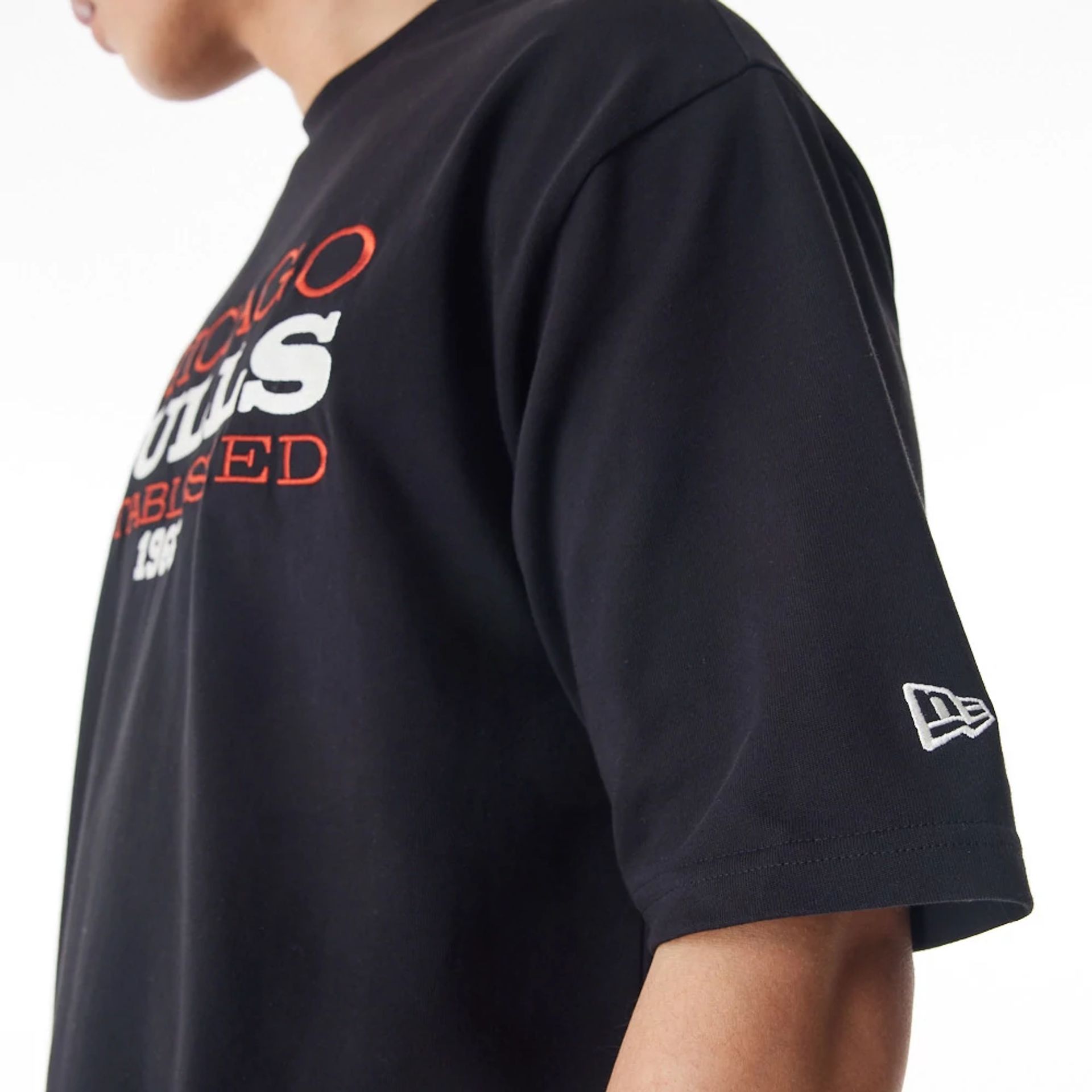 The Male model is wearing Chicago Bulls NBA Lifestyle Black T-Shirt  6