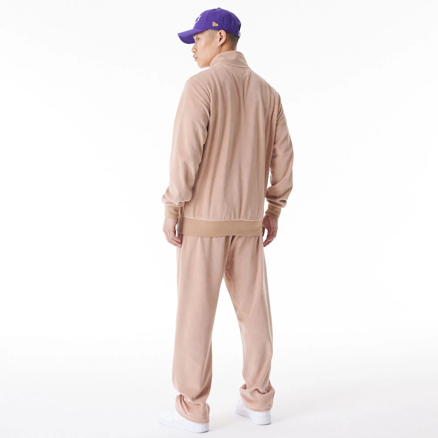 The Male model is wearing LA Lakers NBA Lifestyle Velour Beige Track Jacket  9