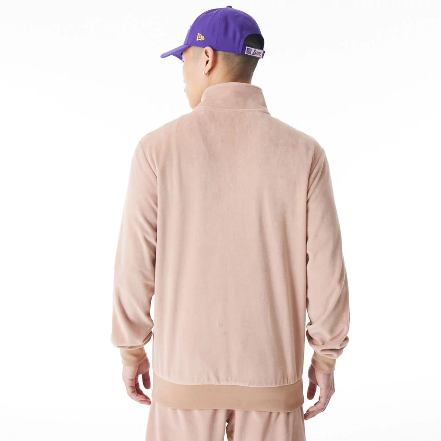 The Male model is wearing LA Lakers NBA Lifestyle Velour Beige Track Jacket  3