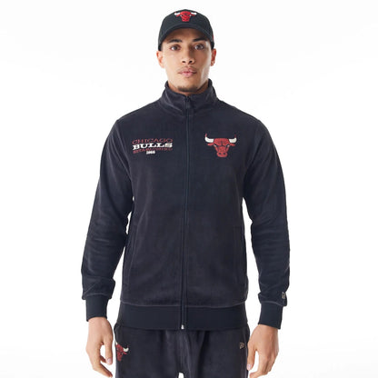 The Male model is wearing Chicago Bulls NBA Lifestyle Velour Black Track Jacket  12