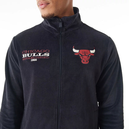 The Male model is wearing Chicago Bulls NBA Lifestyle Velour Black Track Jacket  4