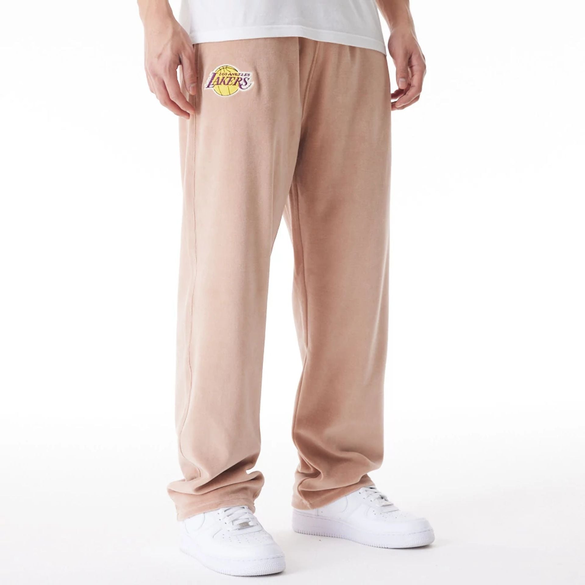 The Male model is wearing LA Lakers NBA Lifestyle Velour Beige Track Joggers  9