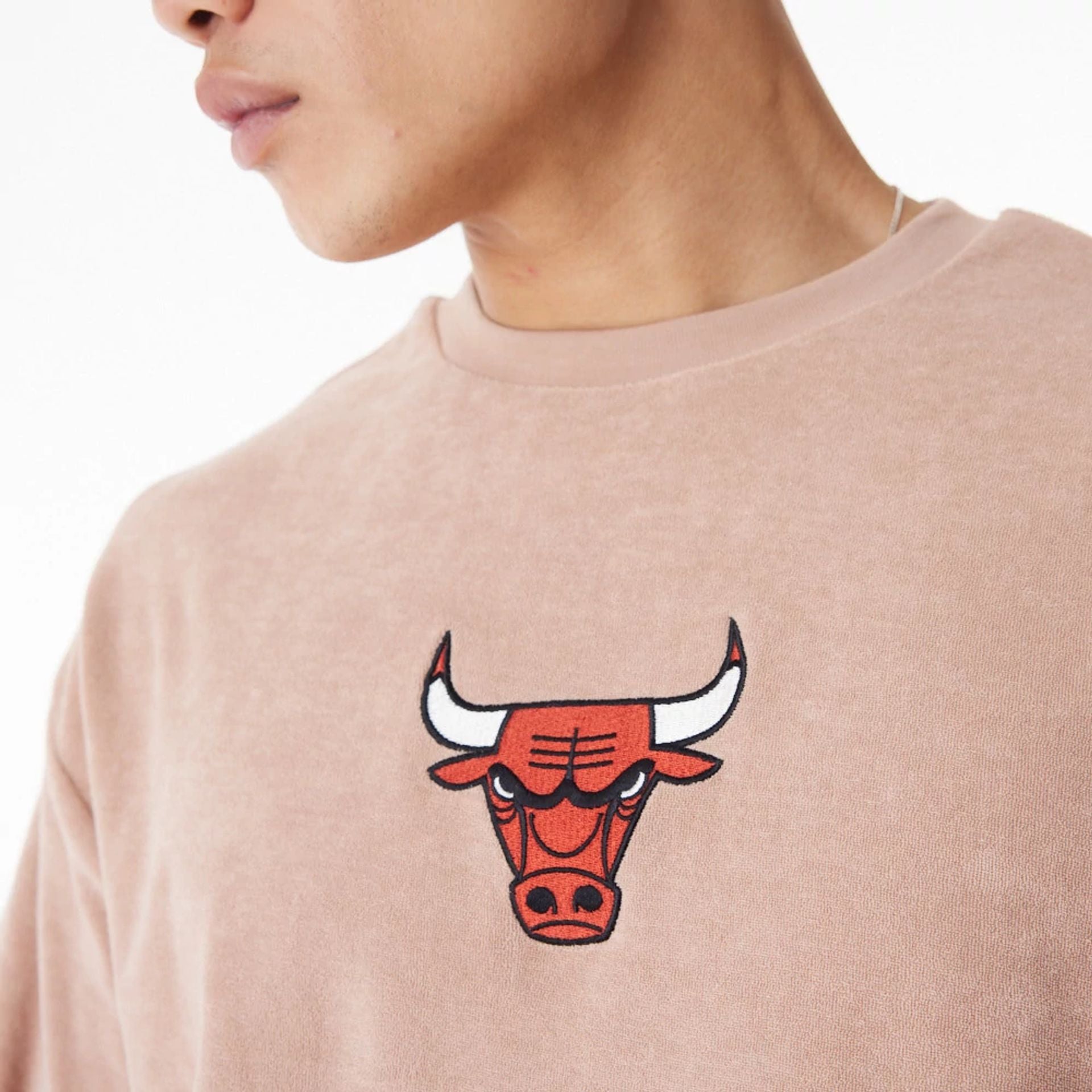 The Male model is wearing Chicago Bulls NBA Lifestyle Velour Beige Oversized T-Shirt  2