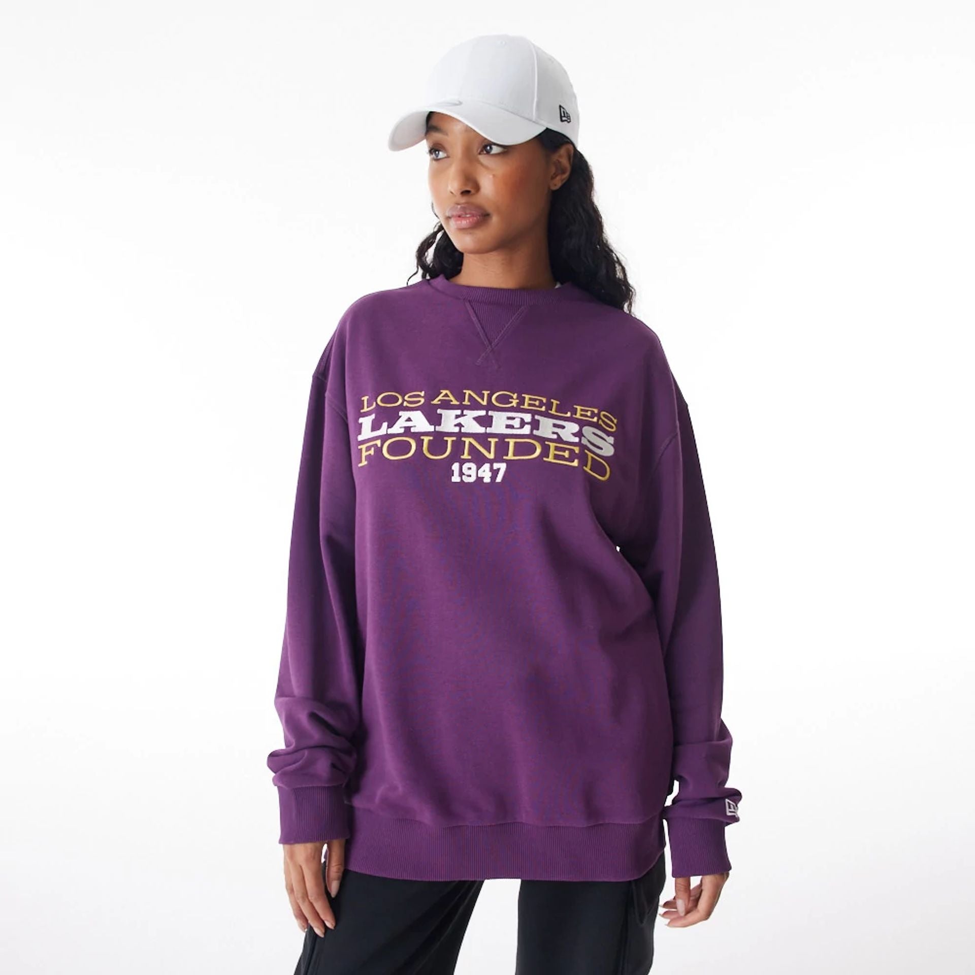 The Male model is wearing LA Lakers NBA Lifestyle Dark Purple Oversized Crew Neck Sweater  6