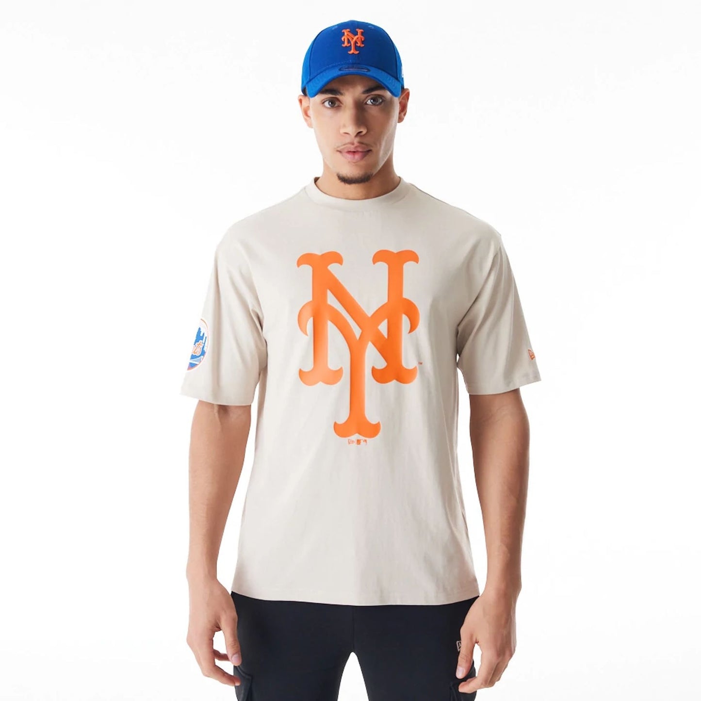 The Male model is wearing New York Mets MLB London Series 2024 Light Beige Oversized T-Shirt 1