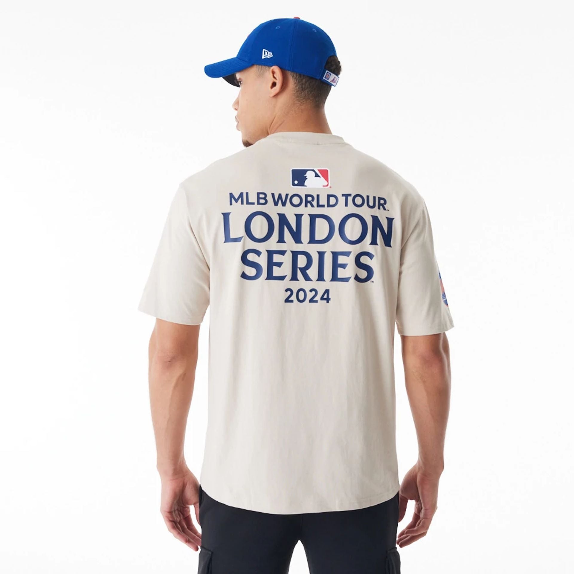 The Male model is wearing New York Mets MLB London Series 2024 Light Beige Oversized T-Shirt 2