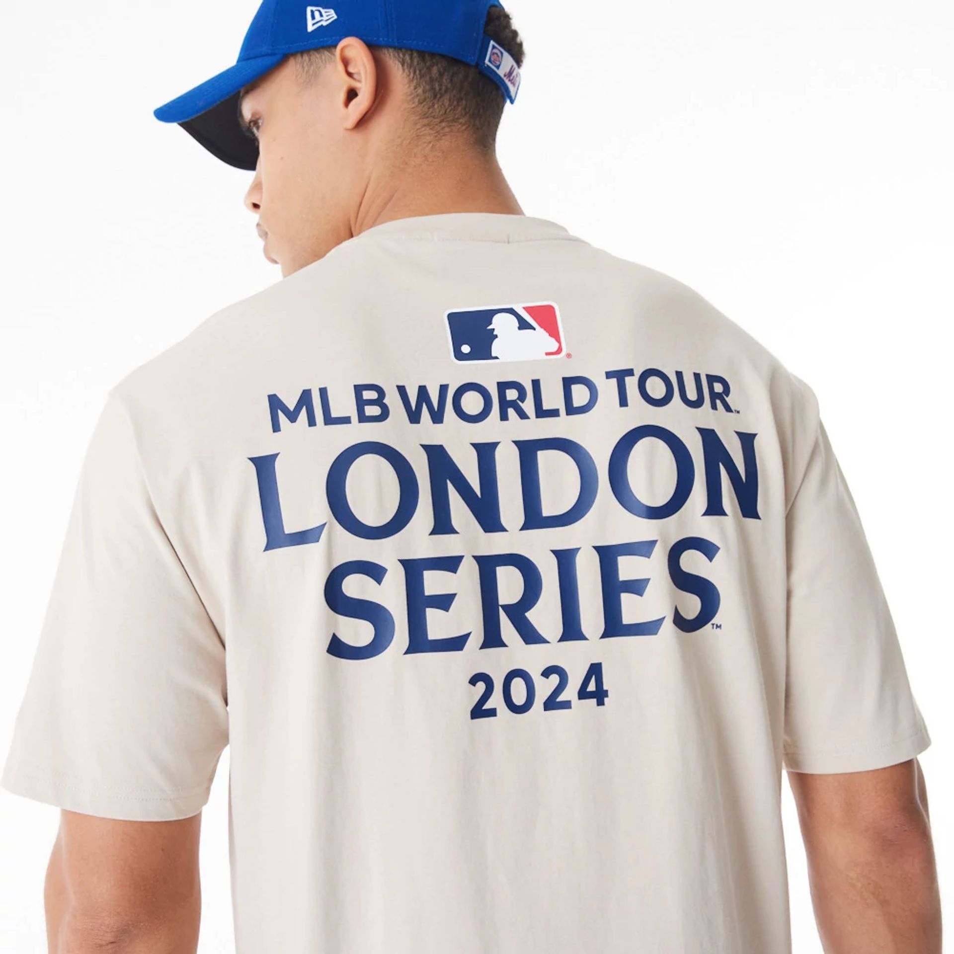 The Male model is wearing New York Mets MLB London Series 2024 Light Beige Oversized T-Shirt 7