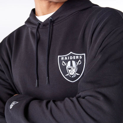 The Male model is wearing Las Vegas Raiders NFL League Essential Black Oversized Pullover Hoodie  7