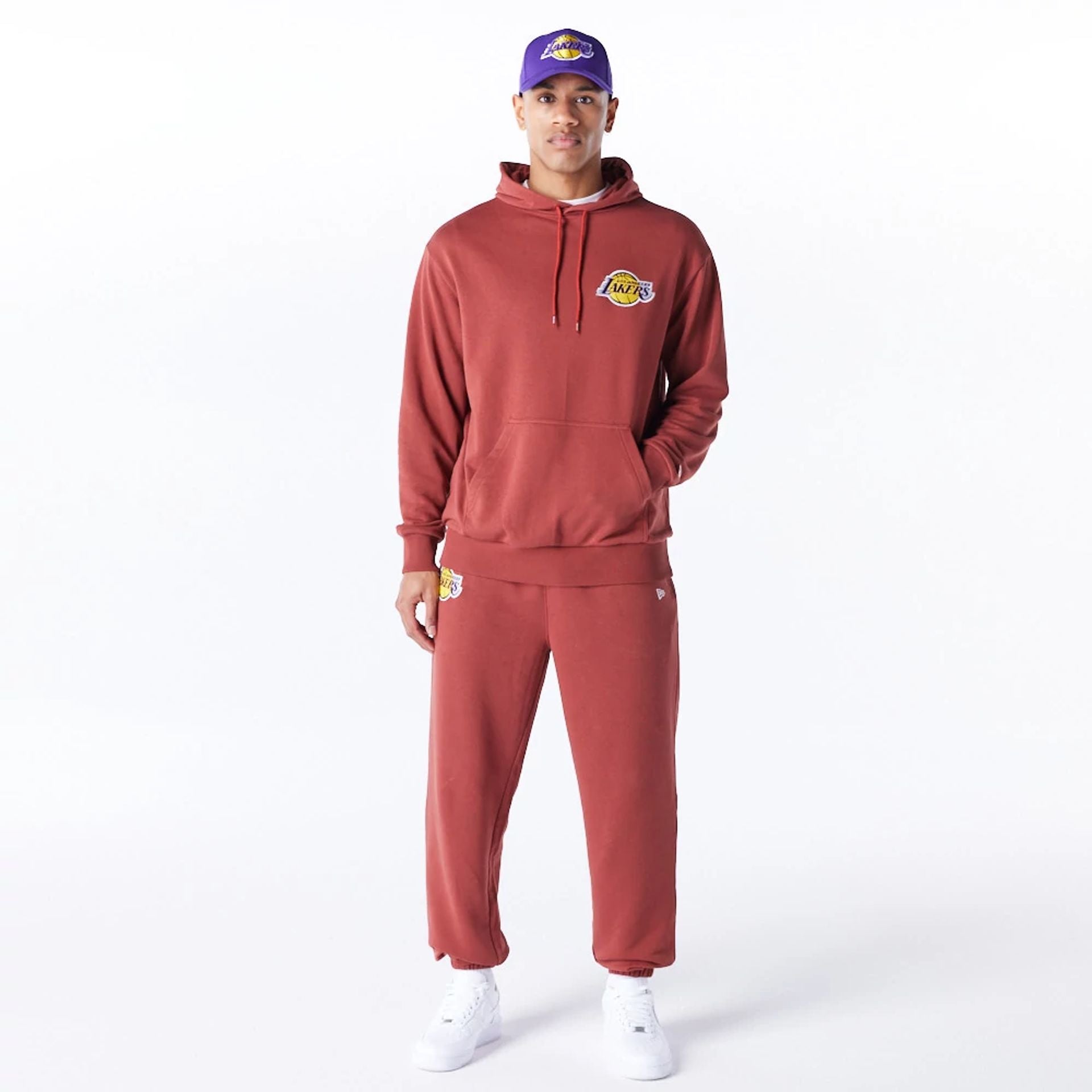 The Male model is wearing LA Lakers League Essential Brown Oversized Pullover Hoodie  1