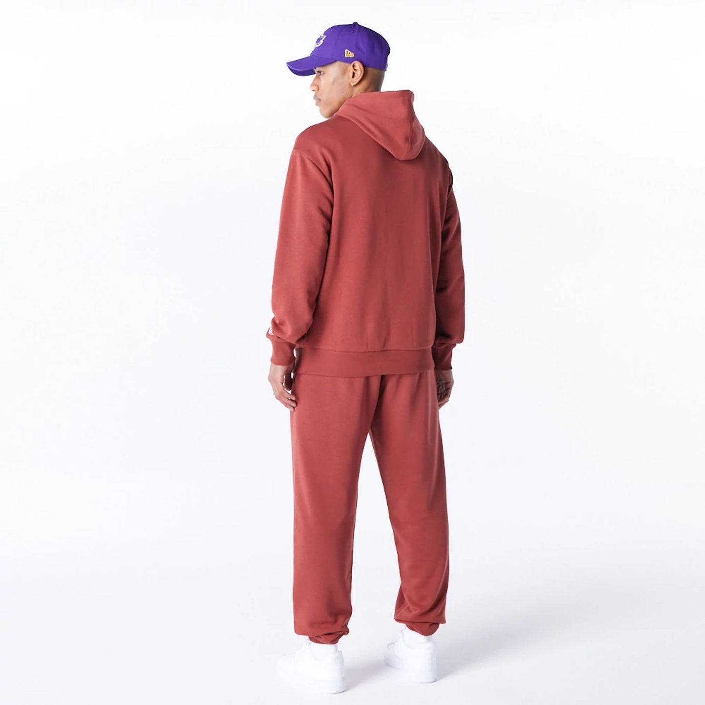 The Male model is wearing LA Lakers League Essential Brown Oversized Pullover Hoodie  4