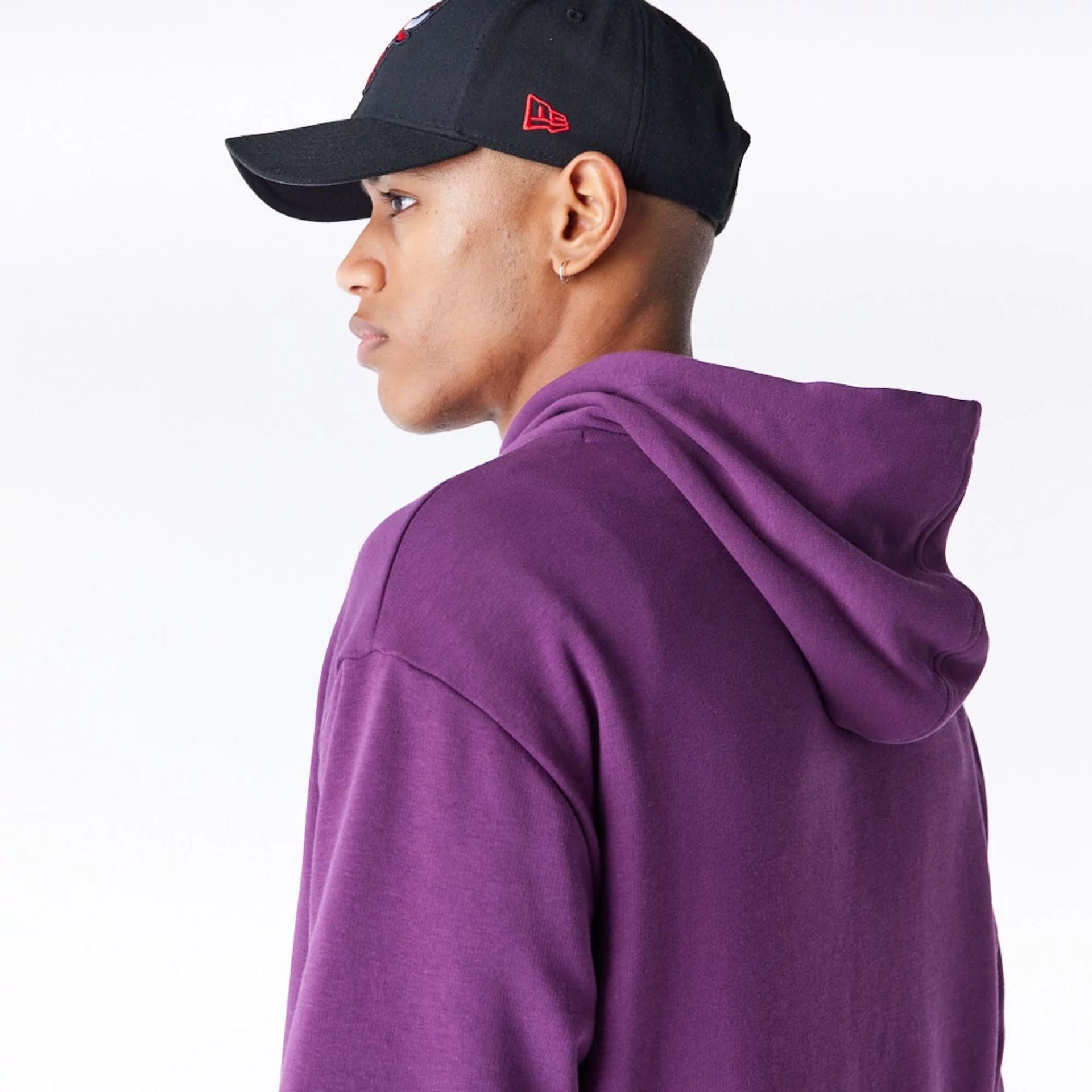 The Male model is wearing Chicago Bulls League Essential Dark Purple Oversized Pullover Hoodie  8