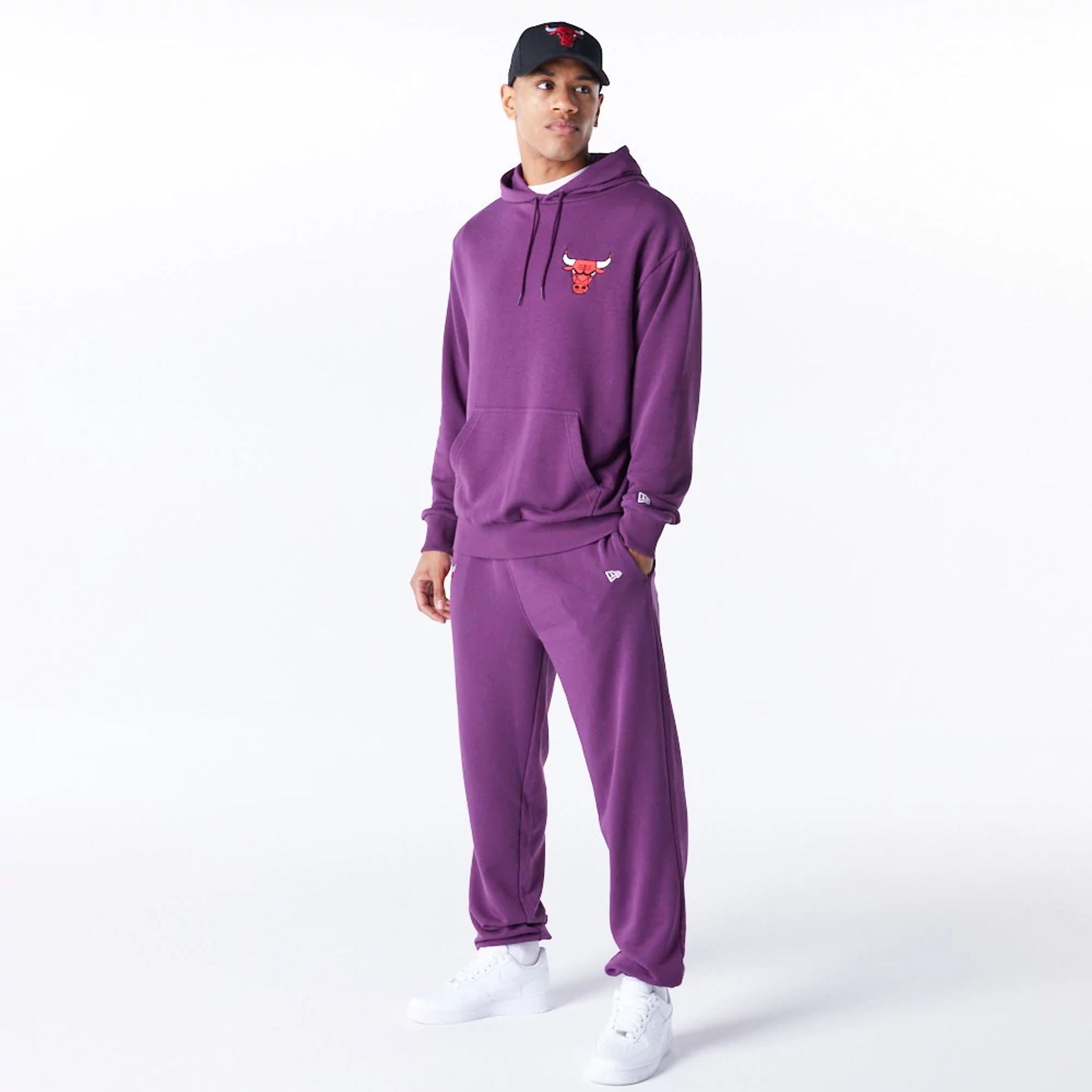 The Male model is wearing Chicago Bulls League Essential Dark Purple Oversized Pullover Hoodie  1