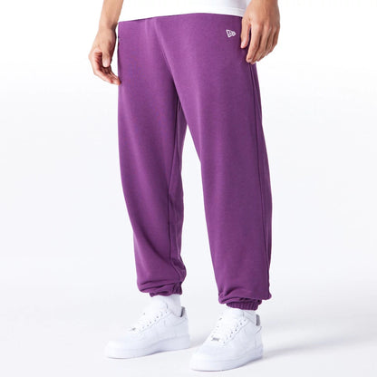 The Male model is wearing Chicago Bulls League Essential Dark Purple Track Joggers  1