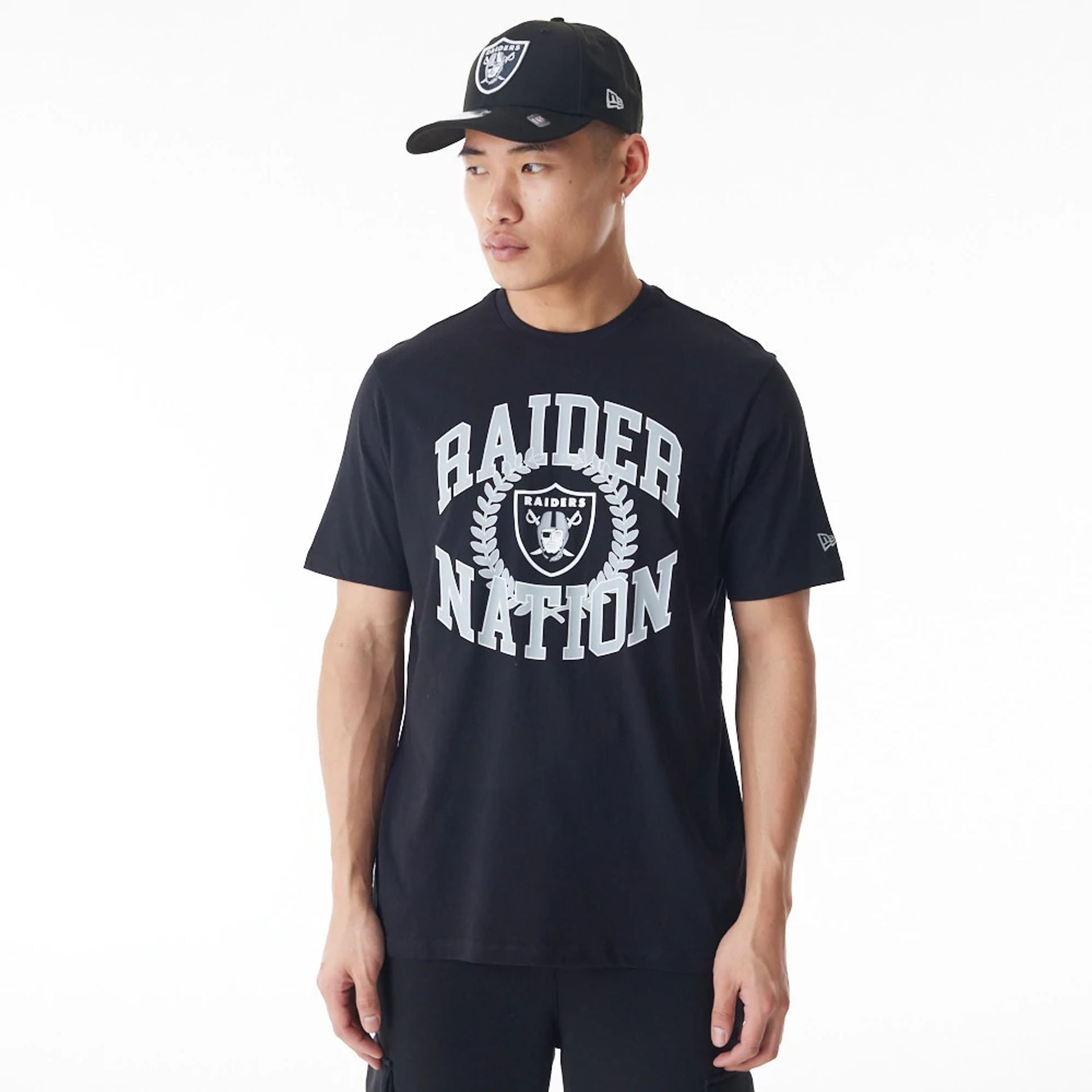 The Male model is wearing Las Vegas Raiders NFL Laurel Graphic Black T-Shirt 1