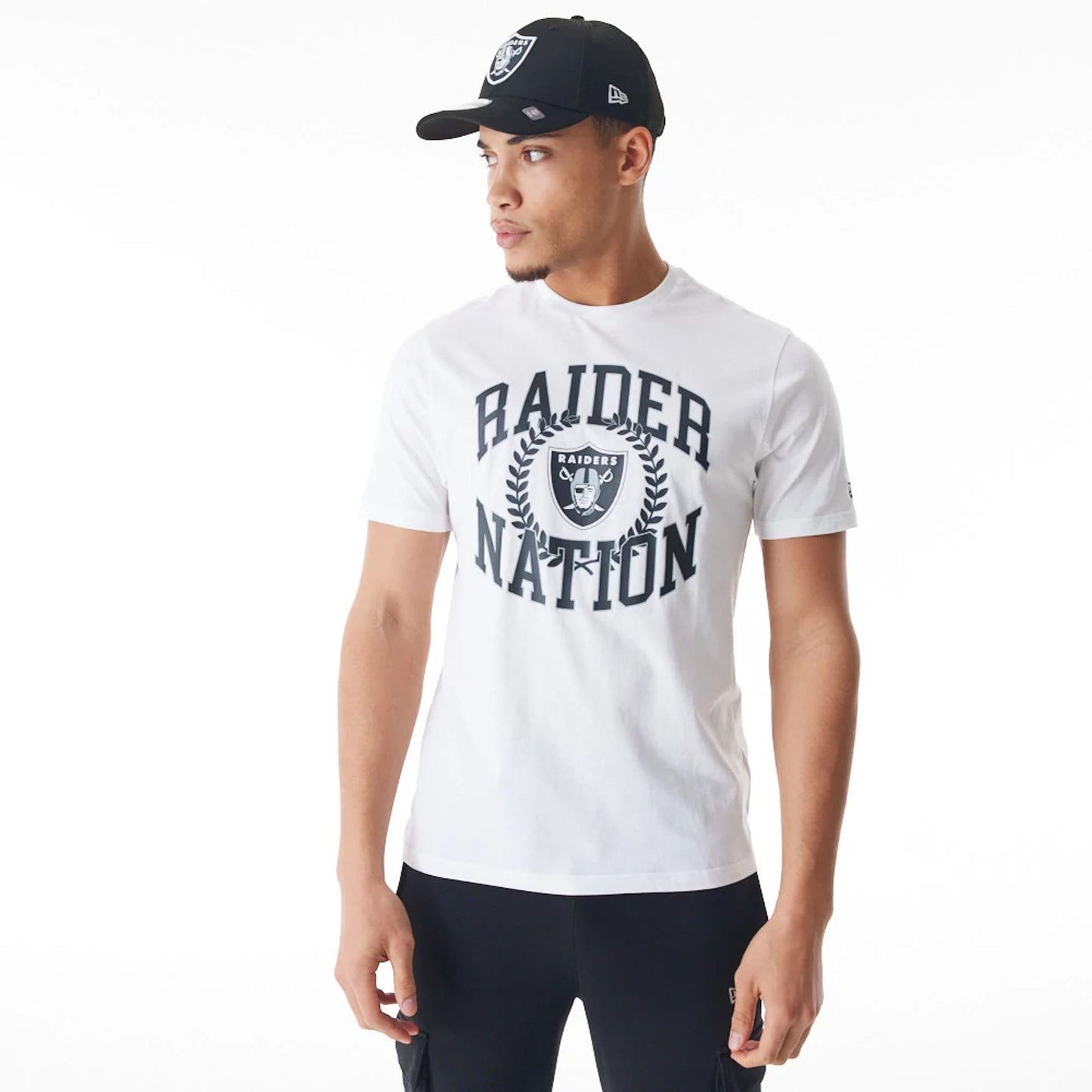 The Male model is wearing Las Vegas Raiders NFL Laurel Graphic White T-Shirt 1