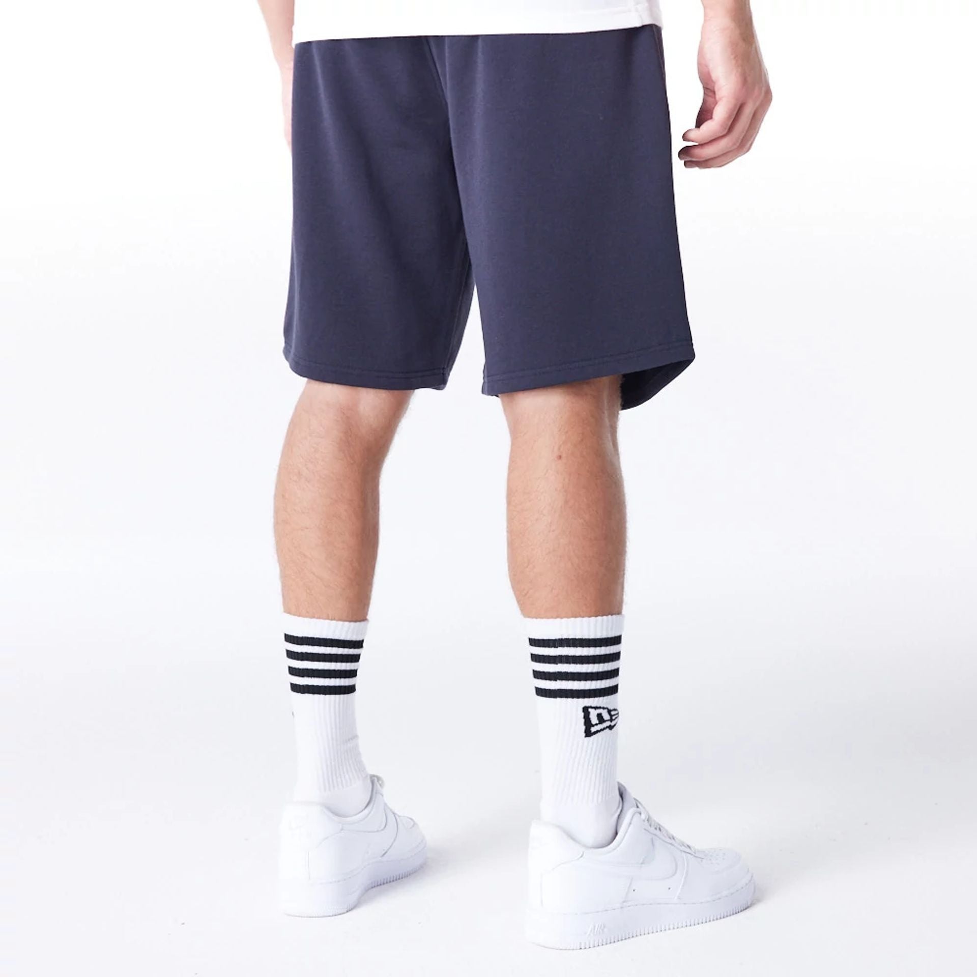 The Male model is wearing New York Yankees MLB Lifestyle Navy Shorts  3