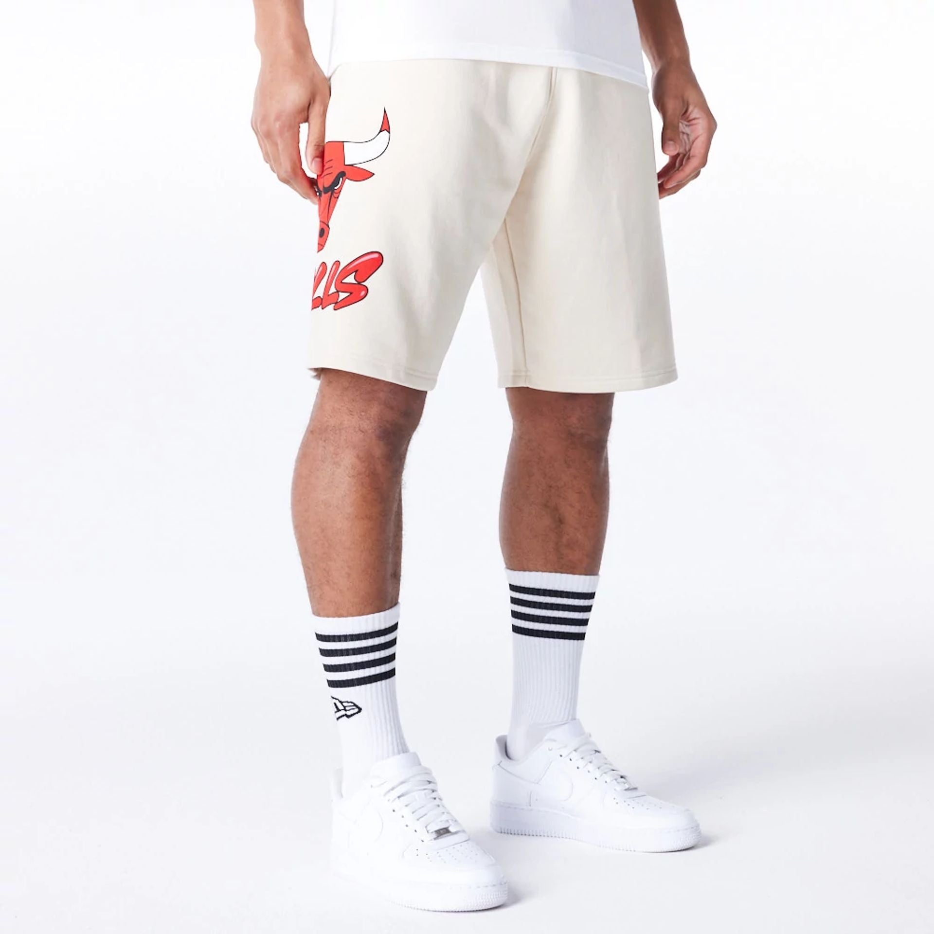 The Male model is wearing Chicago Bulls NBA Bubble Script Light Beige Shorts  1