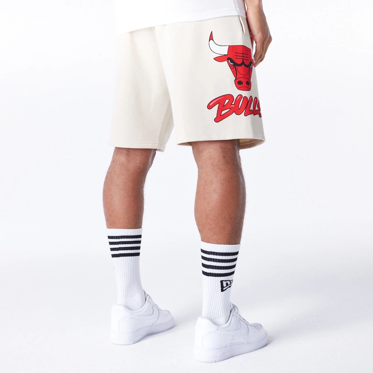 The Male model is wearing Chicago Bulls NBA Bubble Script Light Beige Shorts  5