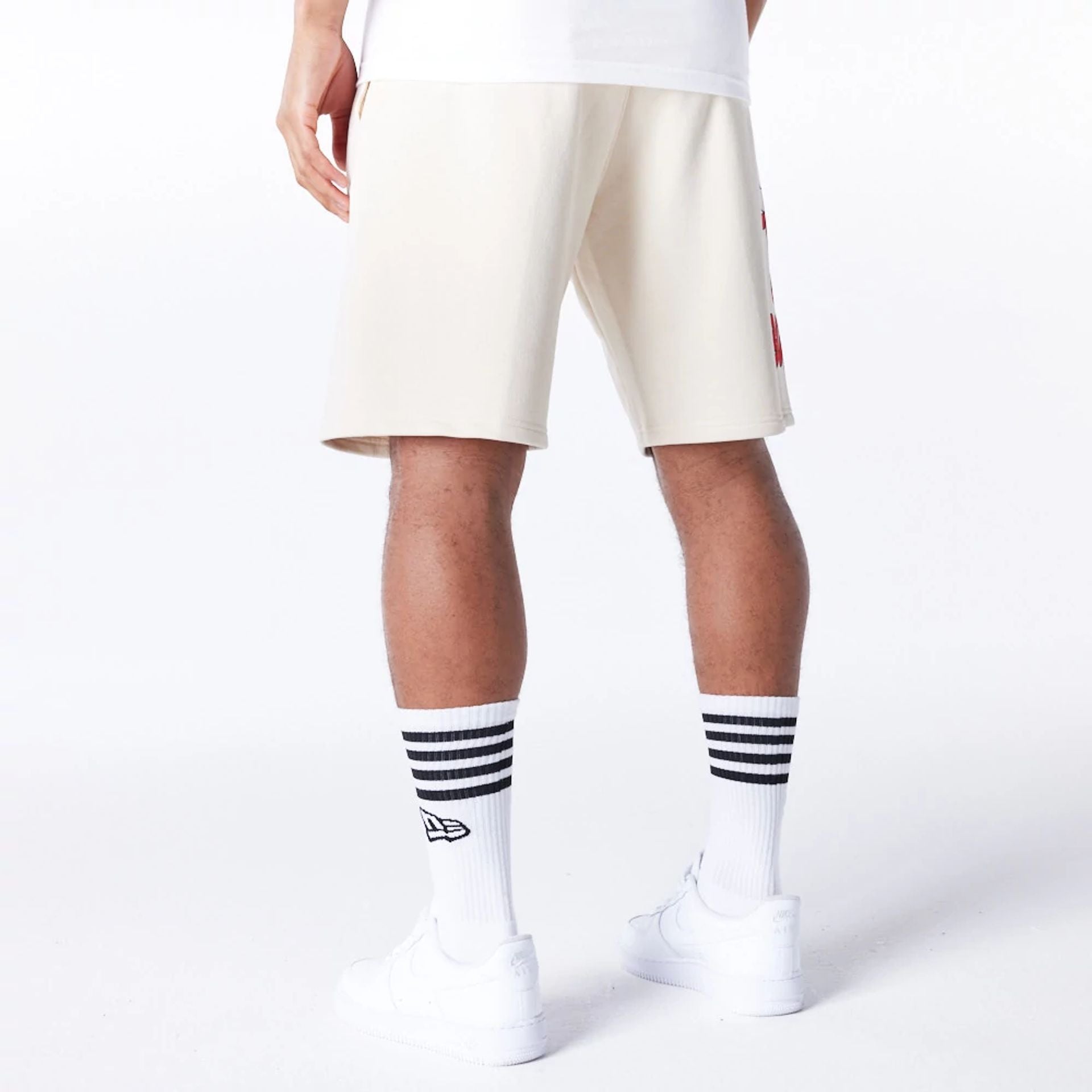 The Male model is wearing Chicago Bulls NBA Bubble Script Light Beige Shorts  6