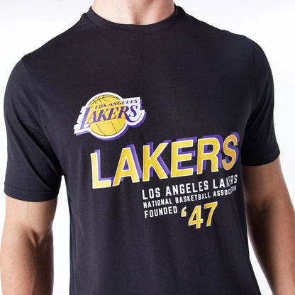 The Male model is wearing LA Lakers NBA Graphic Black T-Shirt 4