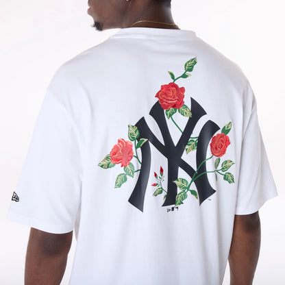 The Male model is wearing New York Yankees MLB Floral Rose Graphic White Oversized T-Shirt 1