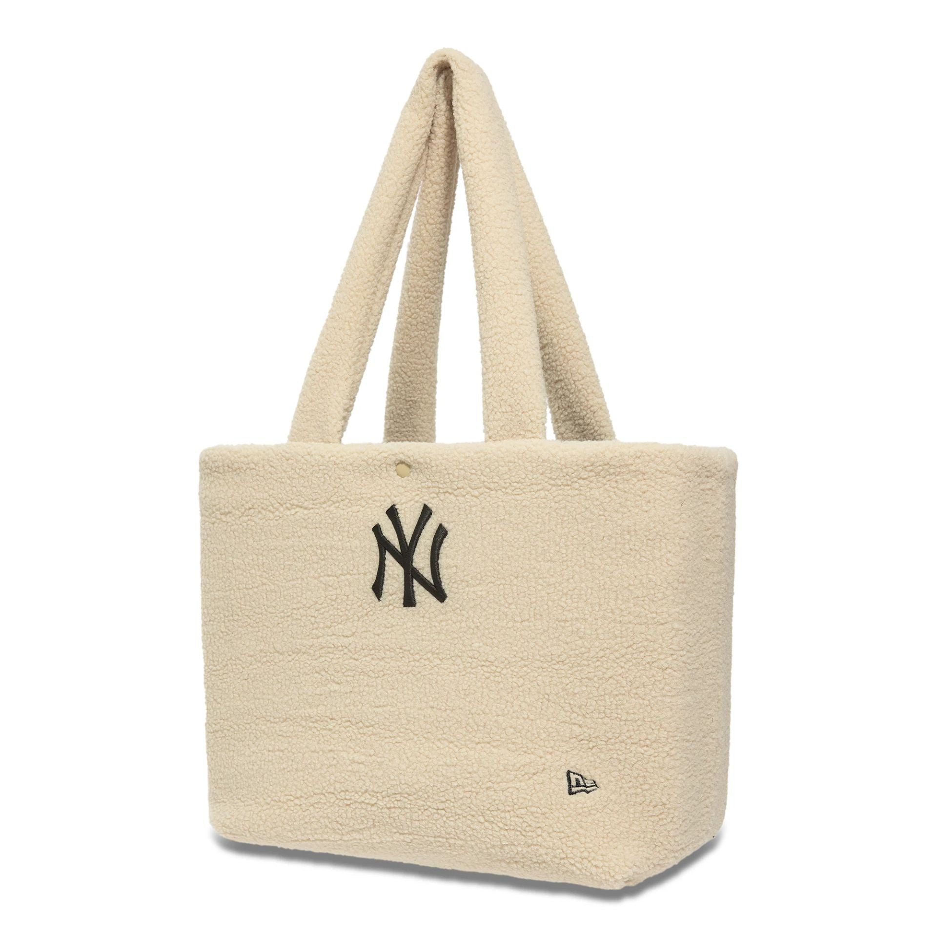 This is a New York Yankees Borg Cream Tote Bag 1