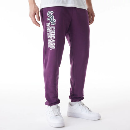 The Male model is wearing Chicago White Sox MLB Gradient Graphic Dark Purple Joggers  1