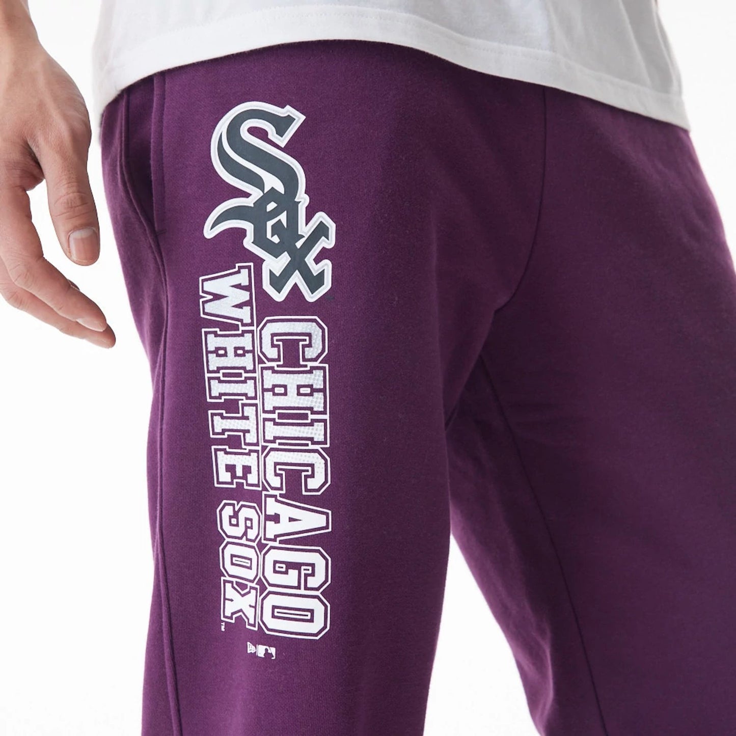 The Male model is wearing Chicago White Sox MLB Gradient Graphic Dark Purple Joggers  7