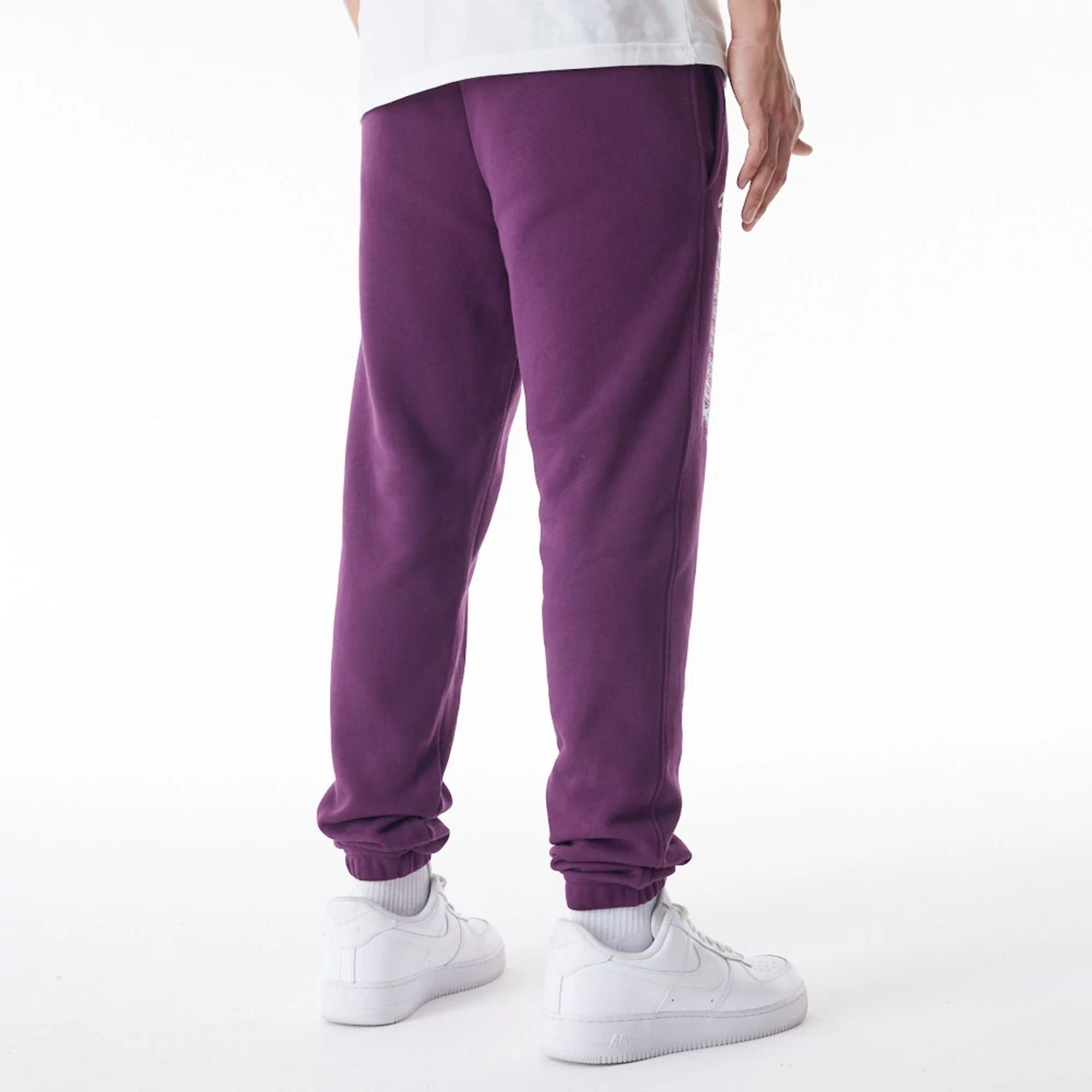 The Male model is wearing Chicago White Sox MLB Gradient Graphic Dark Purple Joggers  2