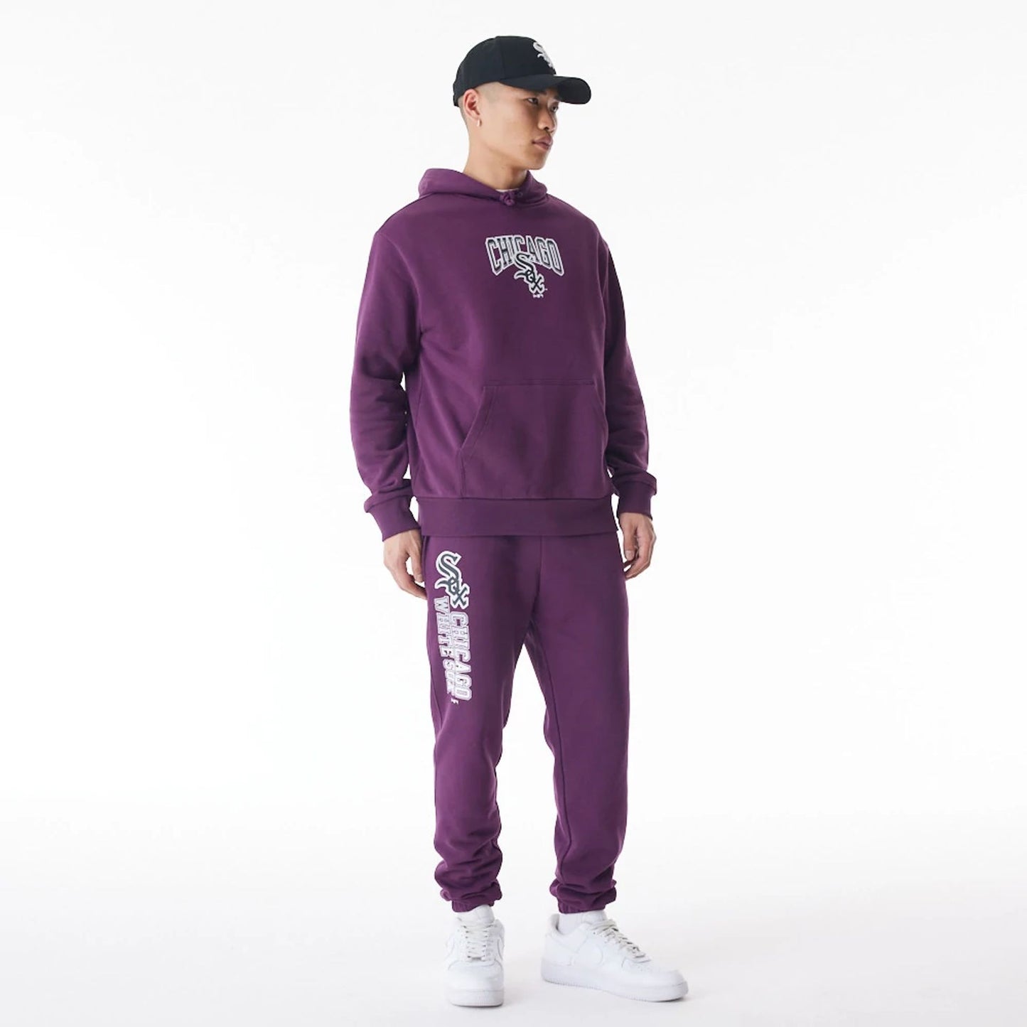 The Male model is wearing Chicago White Sox MLB Gradient Graphic Dark Purple Joggers  6