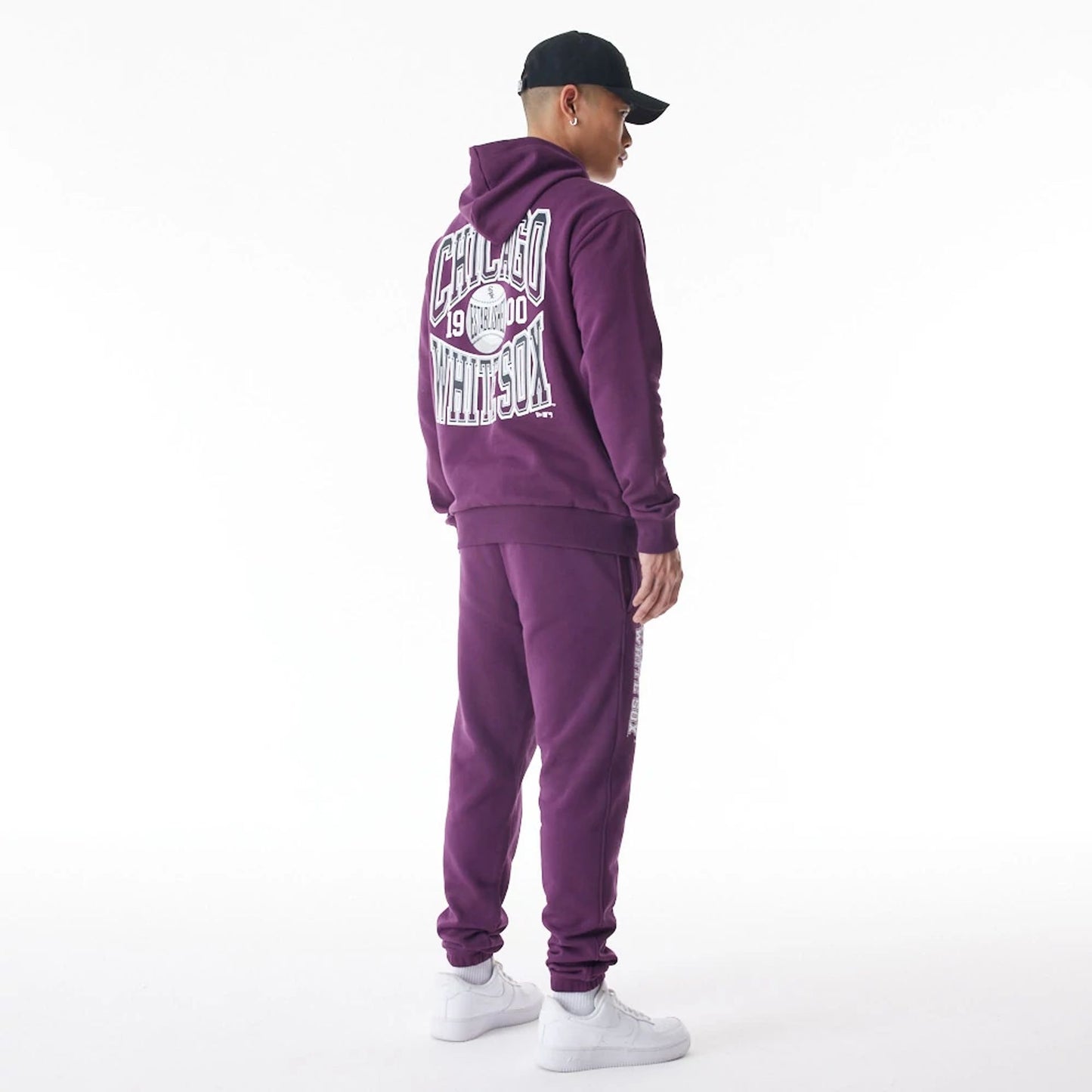 The Male model is wearing Chicago White Sox MLB Gradient Graphic Dark Purple Joggers  5