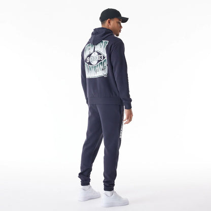 The Male model is wearing New York Yankees MLB Gradient Graphic Navy Joggers  6