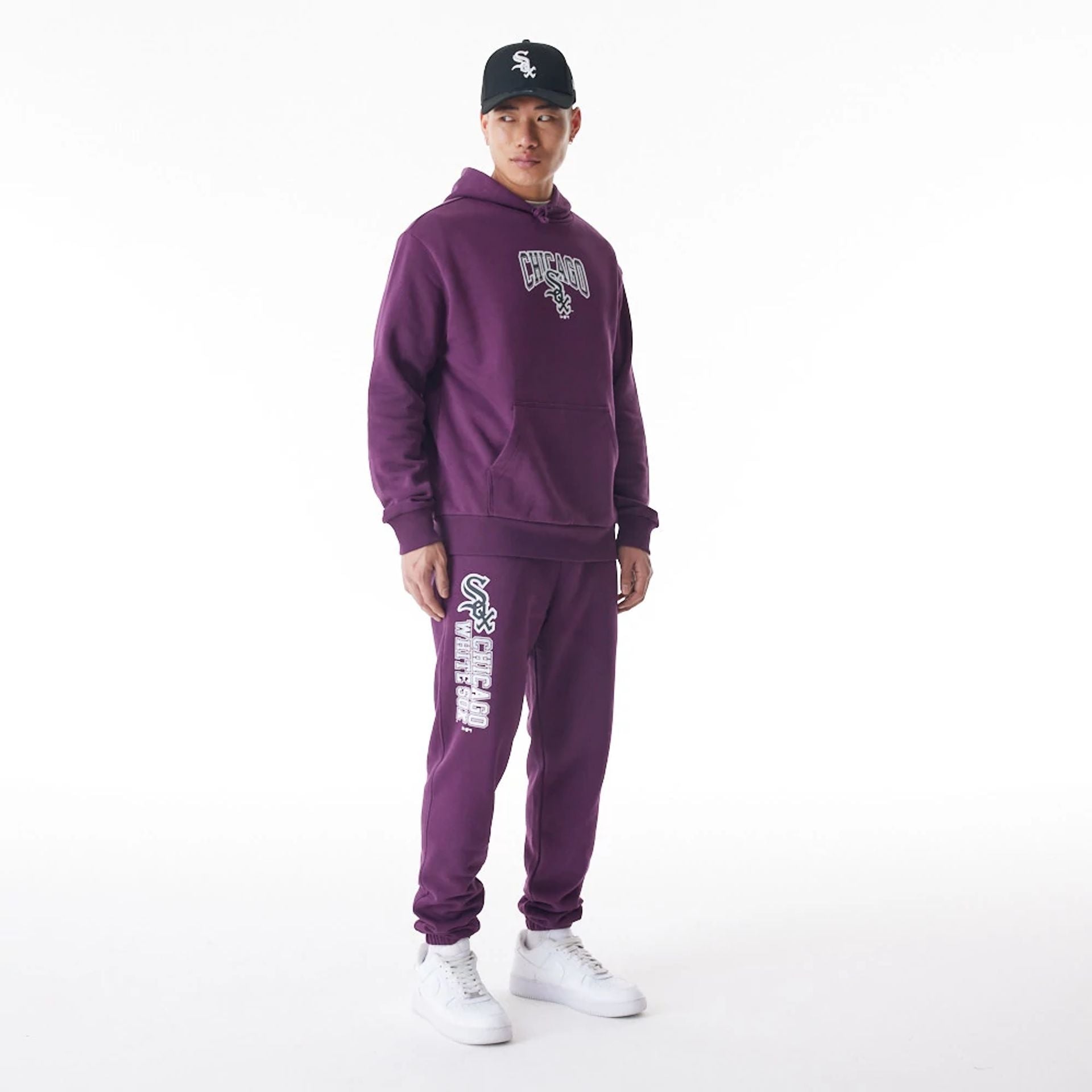 The Male model is wearing Chicago White Sox MLB Gradient Dark Purple Oversized Pullover Hoodie  6