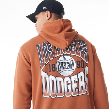 The Male model is wearing LA Dodgers MLB Gradient Brown Oversized Pullover Hoodie  3