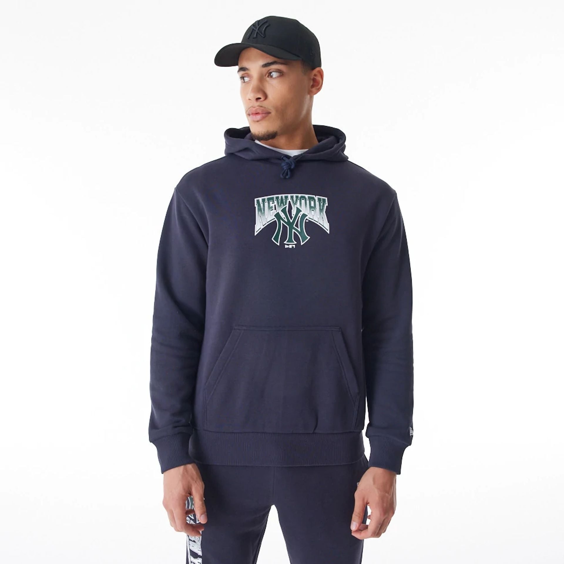 The Male model is wearing New York Yankees MLB Gradient Navy Oversized Pullover Hoodie  1