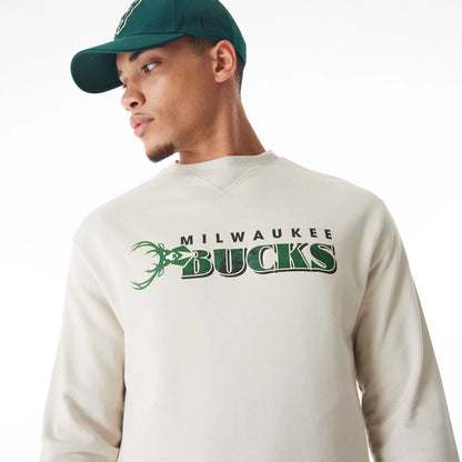 The Male model is wearing Milwaukee Bucks NBA Graphic Cream Crew Neck Sweater  2