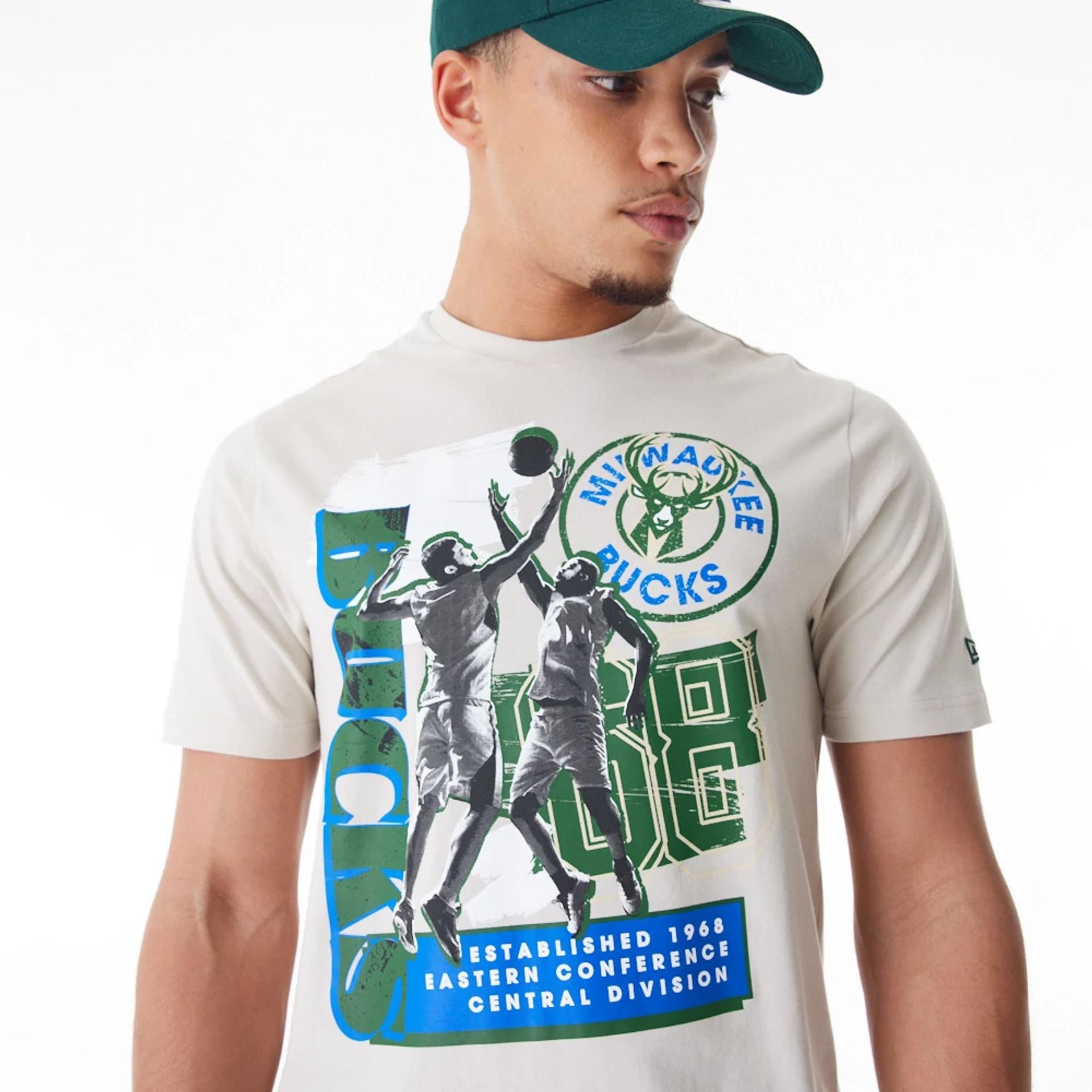 The Male model is wearing Milwaukee Bucks NBA Player Graphic Cream T-Shirt  2