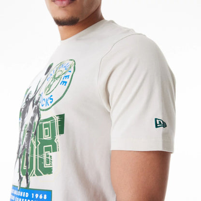 The Male model is wearing Milwaukee Bucks NBA Player Graphic Cream T-Shirt  5