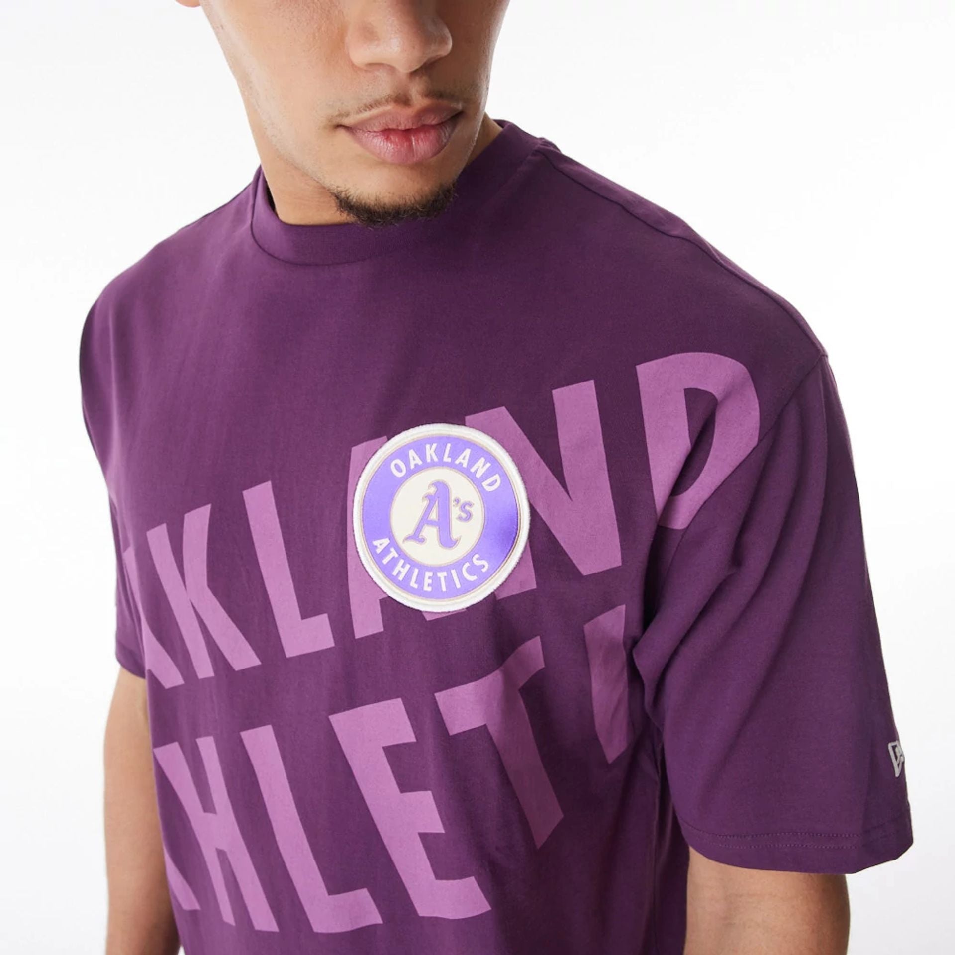 The Male model is wearing Oakland Athletics MLB Script Graphic Dark Purple Oversized T-Shirt  5