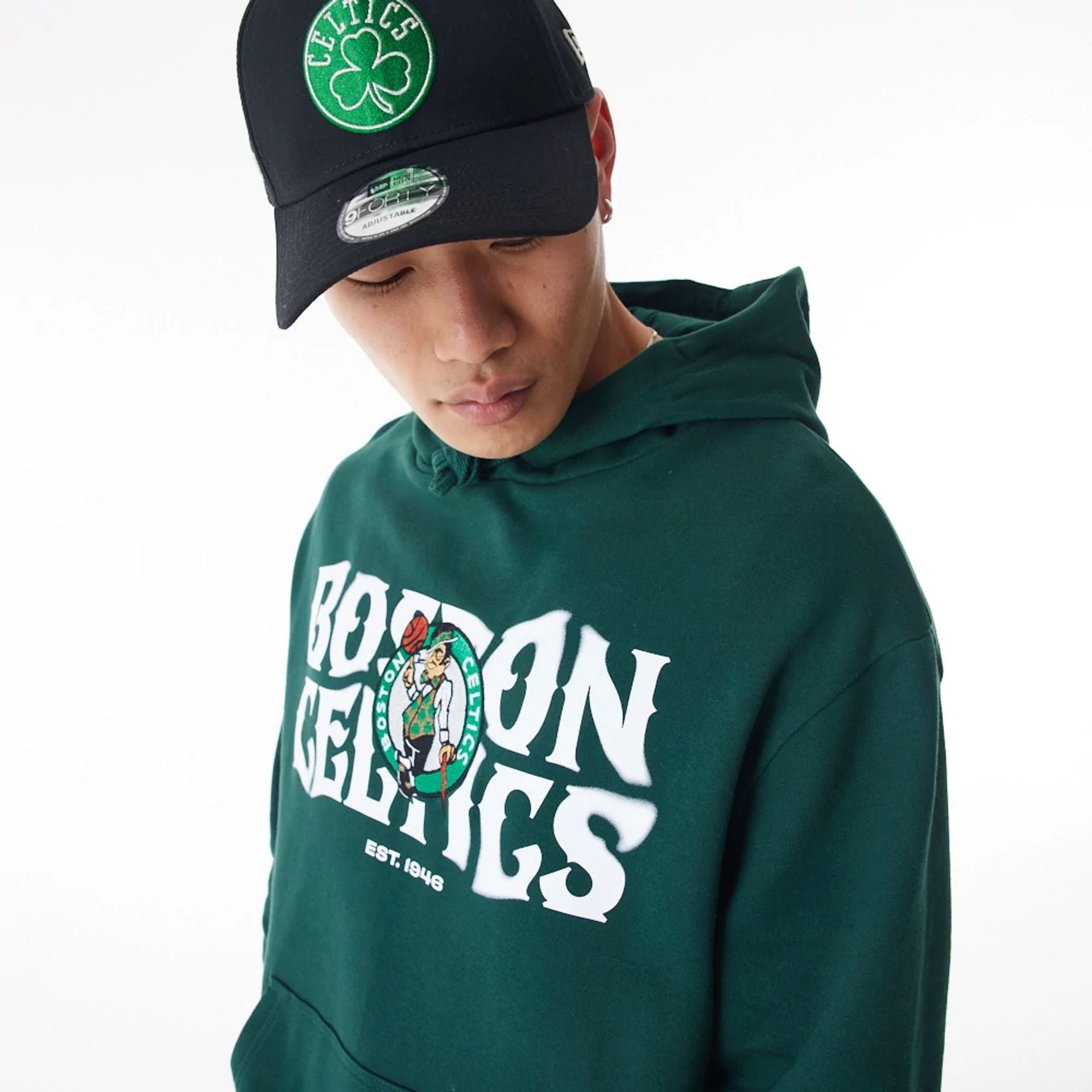 The Male model is wearing Boston Celtics NBA Graphic Dark Green Oversized Pullover Hoodie  4