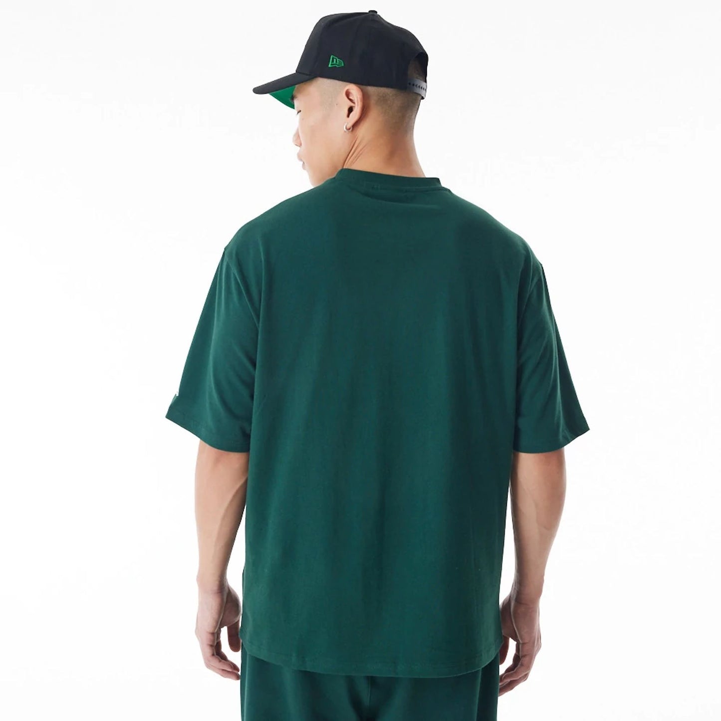 The Male model is wearing Boston Celtics NBA Graphic Dark Green Oversized T-Shirt  2