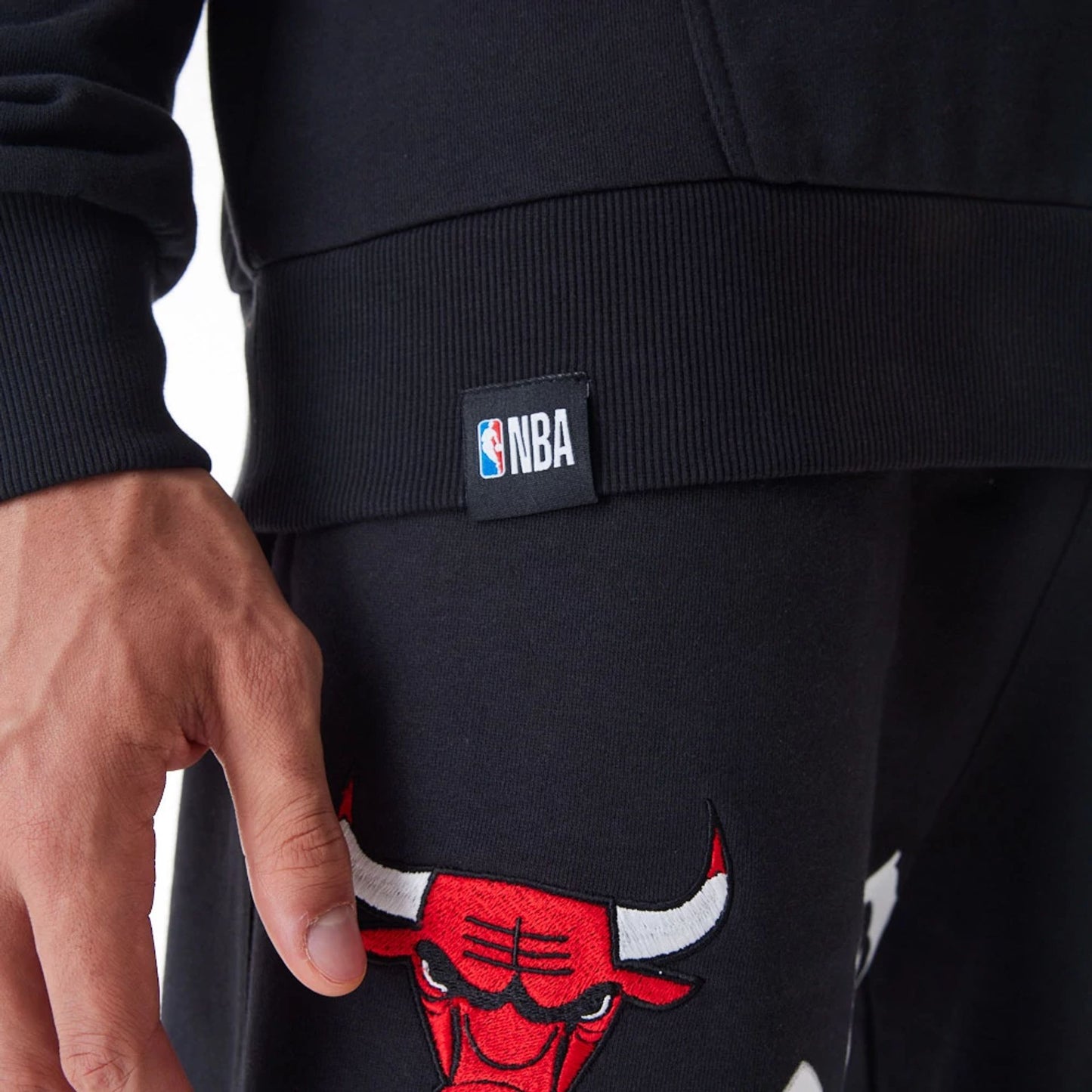 The Male model is wearing Chicago Bulls NBA Graphic Black Oversized Pullover Hoodie  10