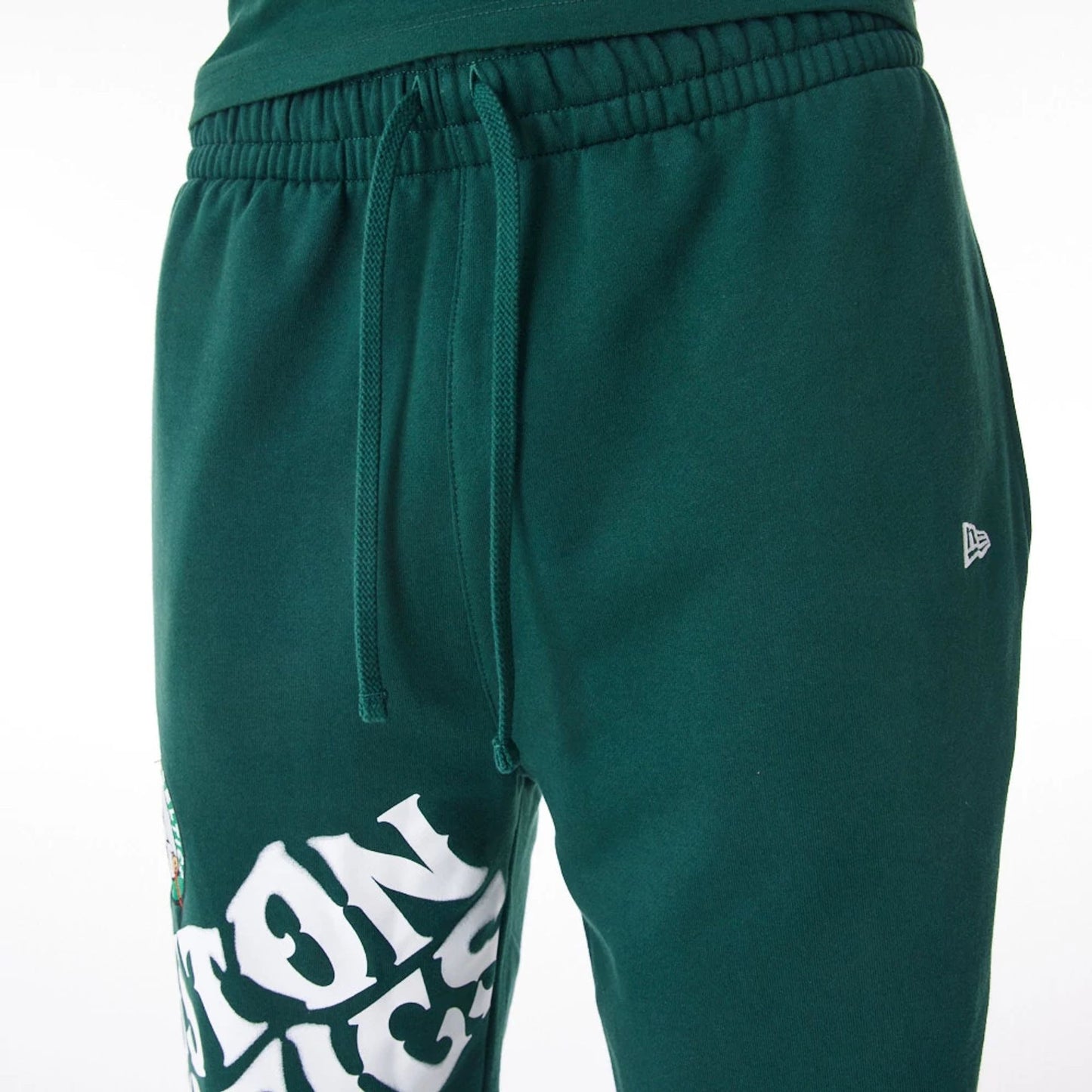 The Male model is wearing Boston Celtics NBA Graphic Dark Green Joggers  5