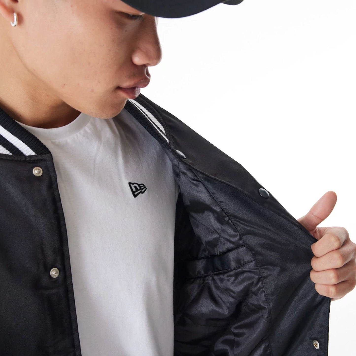 The Male model is wearing Las Vegas Raiders NFL Black Satin Bomber Jacket  8