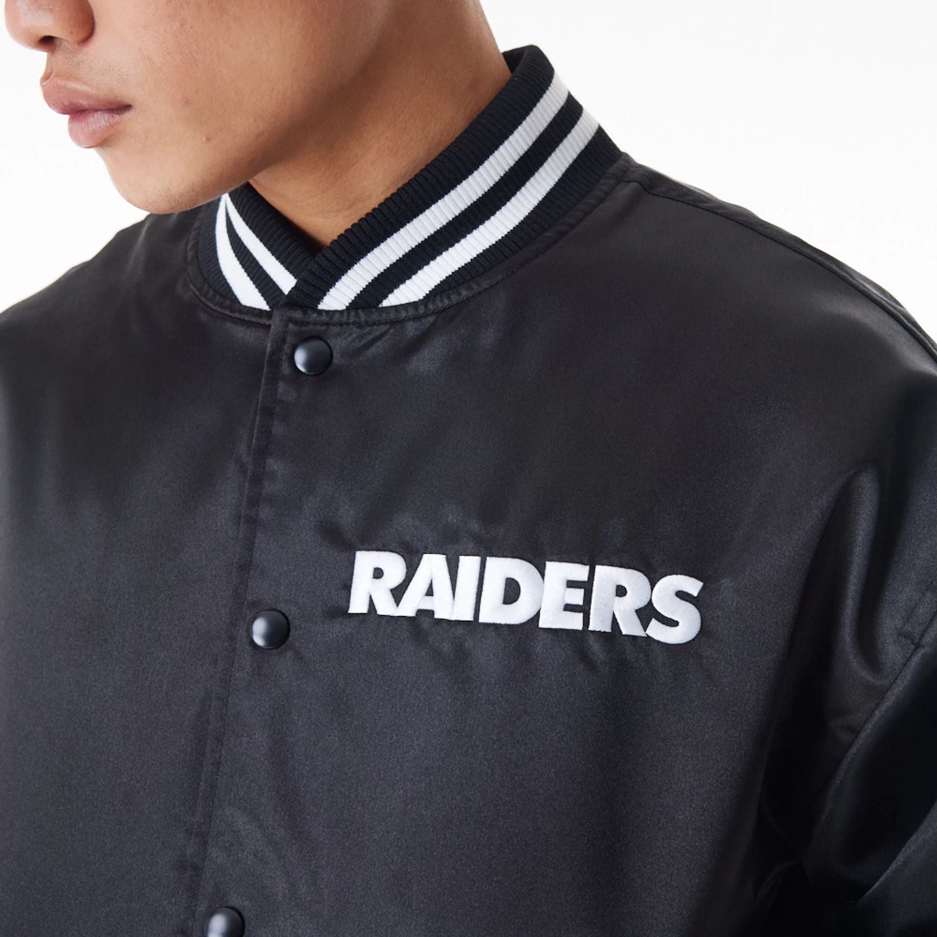 The Male model is wearing Las Vegas Raiders NFL Black Satin Bomber Jacket  9