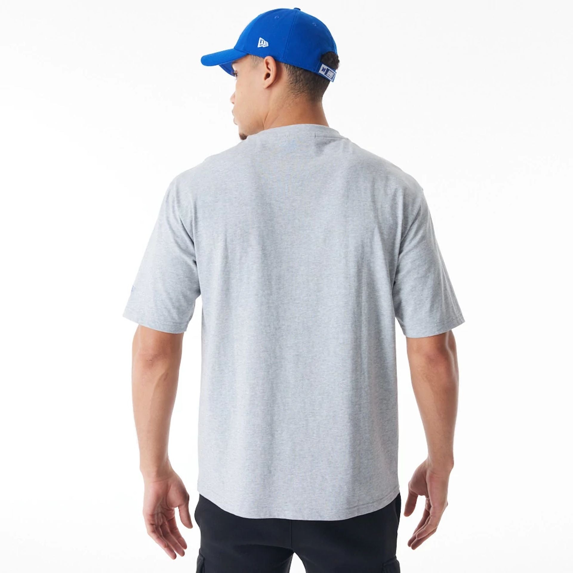 The Male model is wearing New York Giants NFL Helmet Graphic Grey Oversized T-Shirt  2