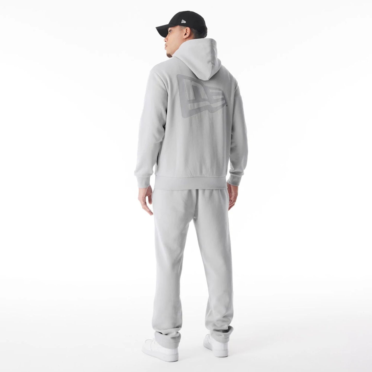 The Male model is wearing  New Era Flag Grey Oversized Pullover Hoodie  3