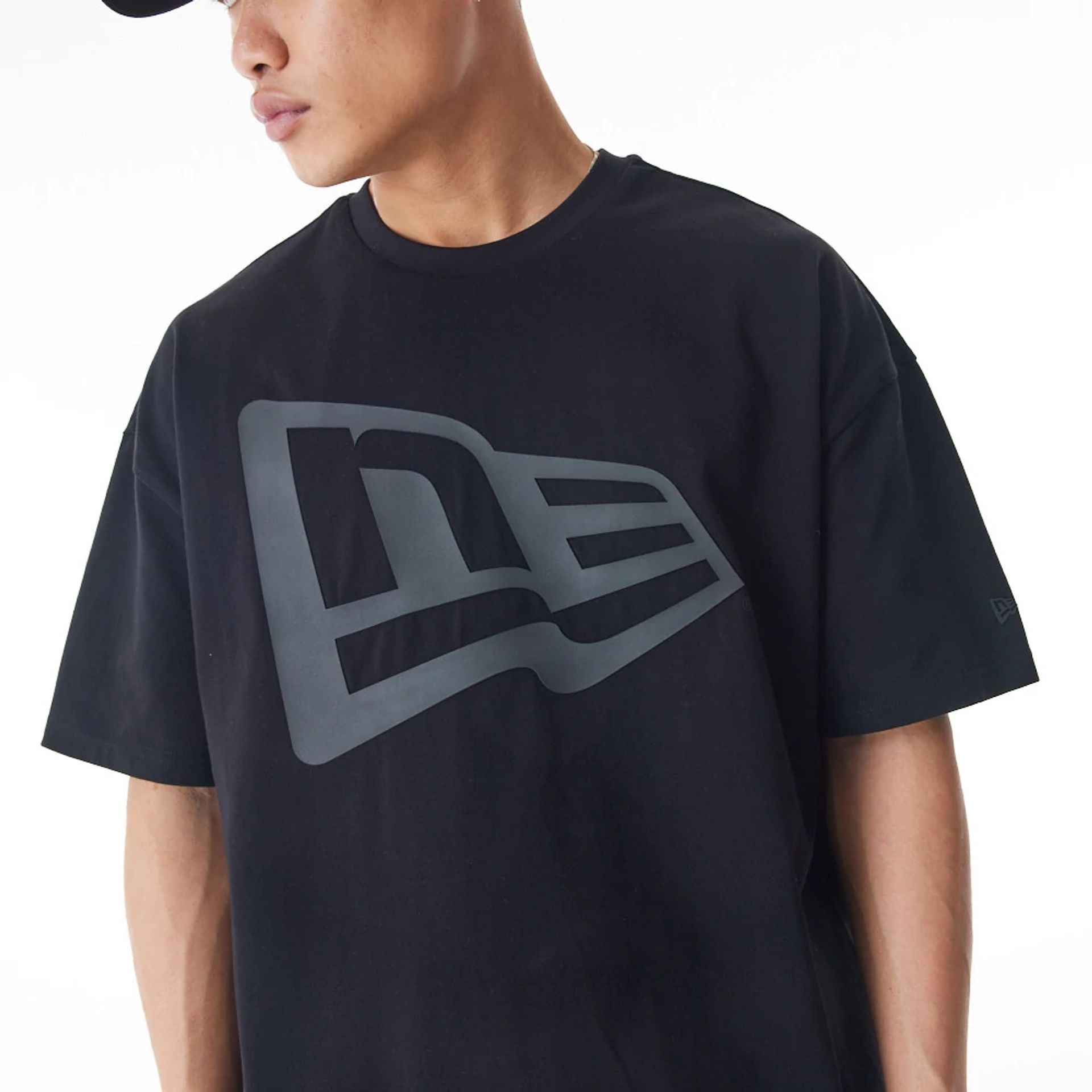 The Male model is wearing  New Era Flag Black Oversized T-Shirt  3